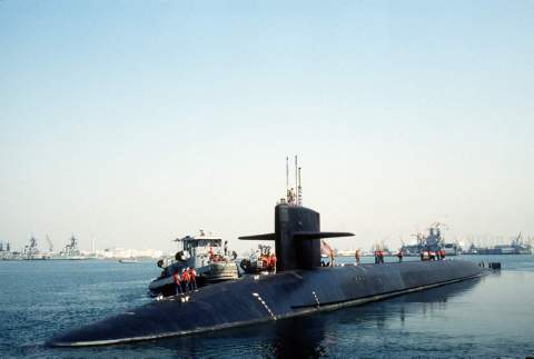 ssbn submarine nevada deck missile strategic nuclear handlers line uss stand powered naval picryl maneuvered shipyard berth harbor tug ytb